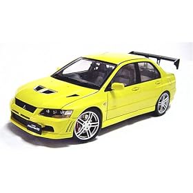 1/18 MITSUBISHI LANCER EVO VII STREET CAR ( MUSTARD YELLOW )( OPTIONAL KIT WITH REAR SPOILER & SPECIAL WHEELS FITTED )