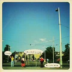 Like a bird in a cage / �����オ��A���̉J