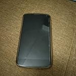 Impeccably maintained Nexus 4 with brand new battery and spare screen