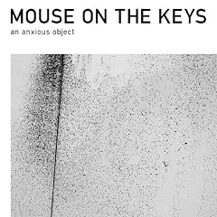 an anxious object / mouse on the keys 