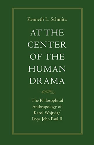 At the center of the human drama Cover