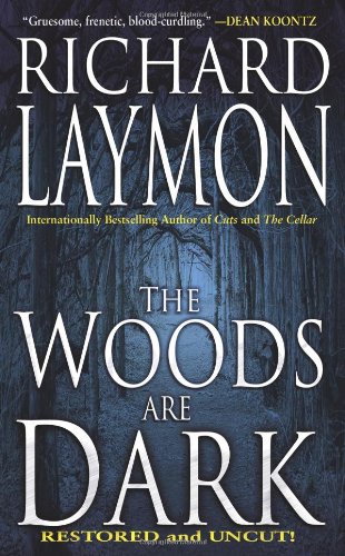 The woods are dark Cover