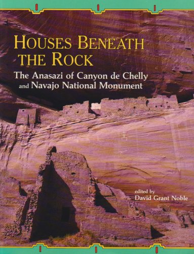 Houses beneath the rock Cover